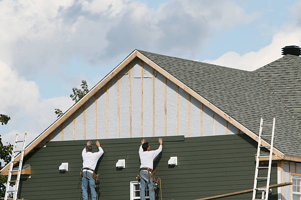 Professional Siding technician working in New Derry, PA
